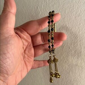 Gold-tone Bracelet with Black Beads and Tassel Drops